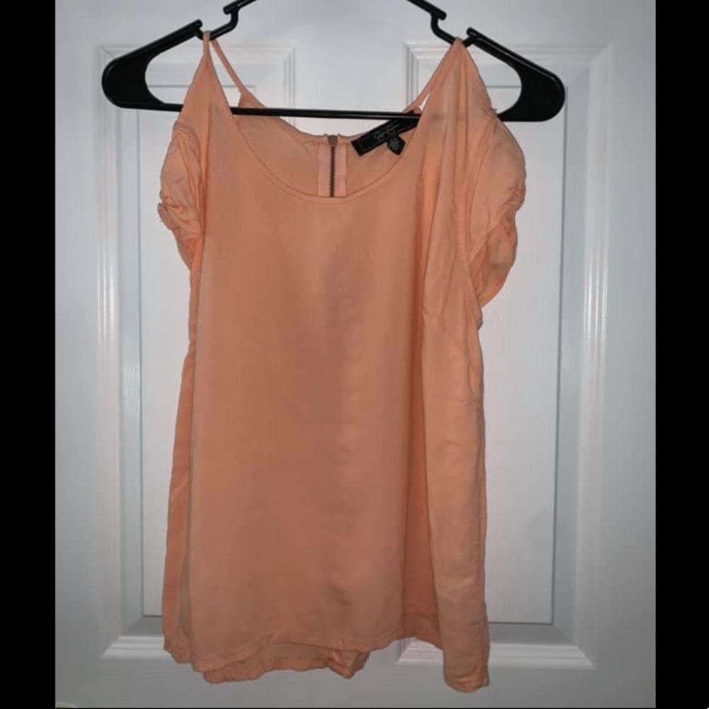 Woman's peach open shoulder top